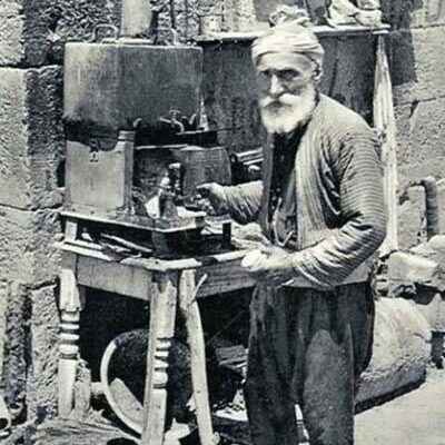 An old man selling brewed coffee in Damascus, 1900.