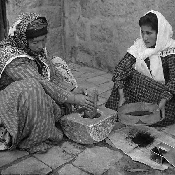 Palestinian women grinding coffee in Jerusalem, 1906.